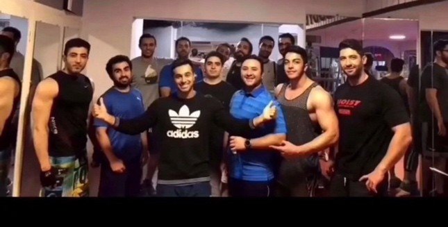 Mah Ghasemi with a group of clients after a session